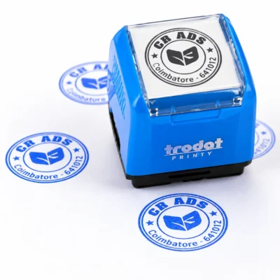 Round self-inking company seal stamp in blue Trodat Printy body with circular logo impressions