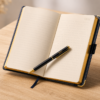 Custom branded corporate diary open showing pages with matching engraved pen